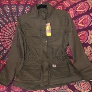 Woman’s green Carhartt utility jacket